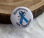 Button sydroom de tourette